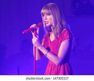 London. UK.  Taylor Swift switches on the Christmas lights at Westfield Shopping Centre, Shepherds Bush, London . 6th November 2012 