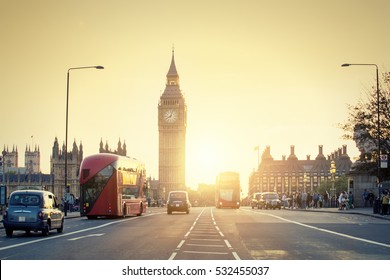 LONDON, UK, Traffic on Westminster bridge with Big Ben and houses of Parliament