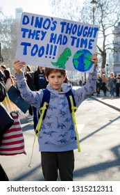 London, UK, United Kingdom 15th February 2019:- Striking school aged children in central London over climate change holding a placard