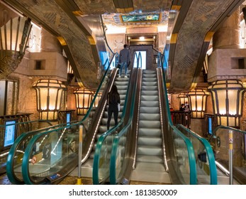 London, UK-09.11.2020: The Central Escalators Inside Harrods Ltd With Its Ornate Classic Architectural Style Mixed With Modern Machinery.