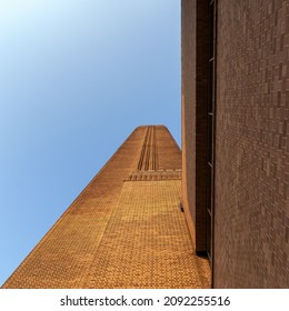 London, UK,4 June 2010: Detail Of The Exterior Brick Walls Of The Tate Modern Tower In London. Abstract Architecture Background. Geometric Structure Fragments.