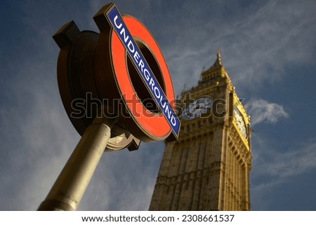 London Underground signage and the Big Ben in summer sunshine