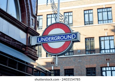 London Underground street signage hanging above walkway - Powered by Shutterstock