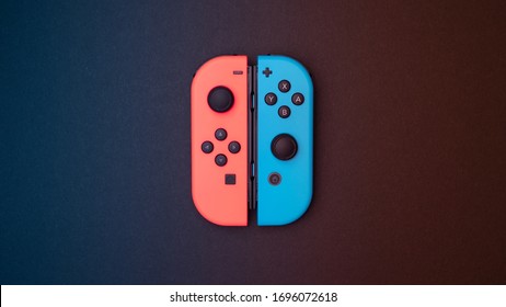 London / United Kingdom - 03 11 2020: Nintendo Switch Joy Con Neon Red And Blue