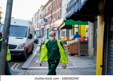 London, London / United Kingdom - 03/05/2020 - British Garbage Collector Wearing A COVID Mask