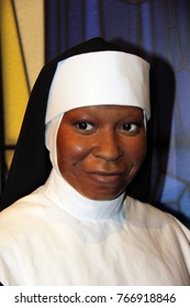 London, - United Kingdom, 08, July 2014. Madame Tussauds in London.  Waxwork statue of Whoopie Goldberg dressed as a nun for the movie Sister Act.. Created by Madam Tussauds in 1884.