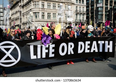 London, United Kingdom, 15th April 2019:- Extinction Rebellion protesters in Parliament Square, hold a funeral for biodiversity loss due to climate change