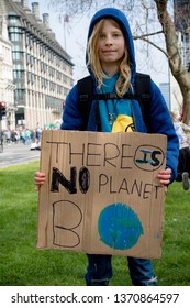 London, United Kingdom, 15th April 2019:- Extinction Rebellion child protester in Parliament Square, protesting about climate change.