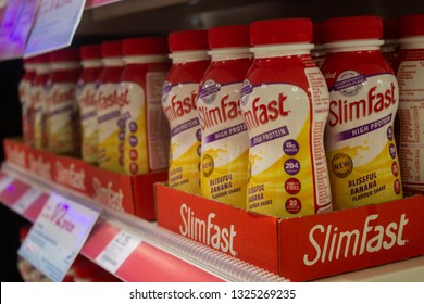 London / United Kingdom - 2.21.2019: Slim Fast Products On A Shelf In A Pharmacy Store