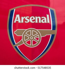 LONDON, UNITED KINGDOM - 27 July 2016 -Logo of London club, Arsenal FC on glass outside the Emirates Stadium.