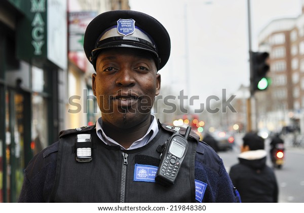 London, United Kingdom - 28. December  2007.,\
Community Support Officer of the Metropolitan Police,Portrait\
captured on the street of London and with the will of Officer to\
pose, some noise may\
occur