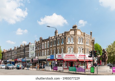 London, United Kingdom, 29 May, 2021: The World Cup Sculpture (The Champions) Is A Bronze Statue Of The 1966 World Cup Final  And Shops Located Near West Ham United Football Club's Now Demolished