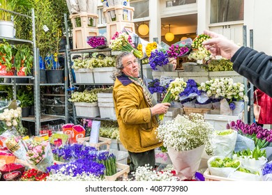 London, United Kingdom - April 17, 2016: Columbia Road Flower Sunday Market. Street Traders Are Selling Their Stock, People Choosing Flowers