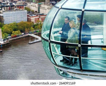 London, United Kingdom - April 29, 2008 : Close View Of One Of The Cabins Of London Eye - People Looking At The Breathtaking View Of The City