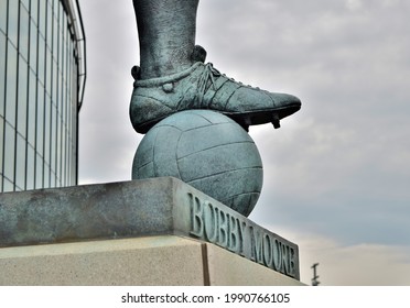 LONDON, UNITED KINGDOM - Aug 23, 2015: Statue monument of legendary football or soccer player Bobby Moore, captain of 1966 England football team, outside Wembley Stadium in London, UK
