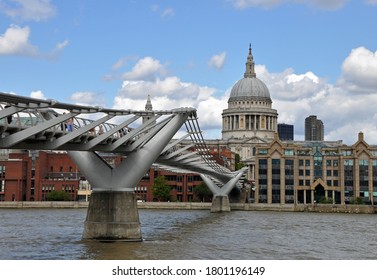 London, United Kingdom, August 2, 2020. Offset View Of Millenium Bridge From Southbank Of River Thames Toward St Pauls Cathederal Dome In The Distance. London, United Kingdom, August 2, 2020