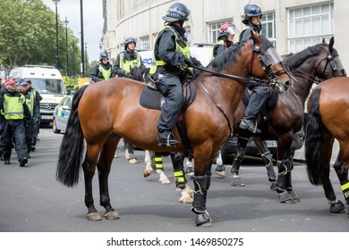 London, United Kingdom, August 3rd 2019:- Police on horseback during an anti fascist demonstration in opposition to a rally by supporters of the former EDL leader Tommy Robinson 