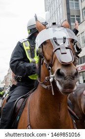 London, United Kingdom, August 3rd 2019:- Police on horseback during an anti fascist demonstration in opposition to a rally by supporters of the former EDL leader Tommy Robinson 