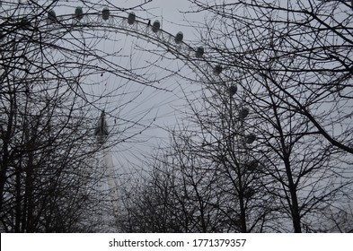 London, United Kingdom - Dec 24th 2018: London Eye View On A Winter Day Through The Trees