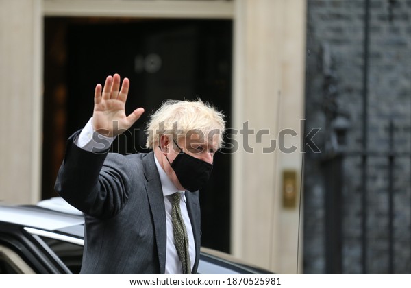 London, United Kingdom - December\
09 2020: UK Prime Minister Boris Johnson arrives in 10 Downing\
Street in London ahead of flying to Brussels for Brexit trade\
talks.