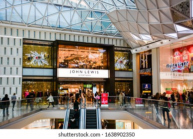 London / United Kingdom — December 10, 2019: entrance to the John Lewis & Partners department store, one of the flagship stores of Westfield London, a large shopping mall in Shepherd's Bush, London