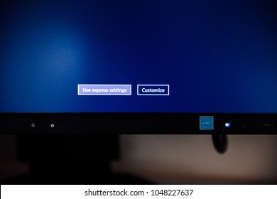 LONDON, UNITED KINGDOM - FEB 13, 2015: Use Express Settings And Customise Buttons On A Computer Display Energy Star During Microsoft Windows Installation On A New PC Workstation