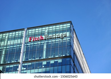 London, United Kingdom - February 03, 2019: Fitch Ratings Logo Signage At Top Of Their Headquarters In UK (other Is In New York), Canary Wharf. FR Is One Of The Big Three Credit Rating Agencies