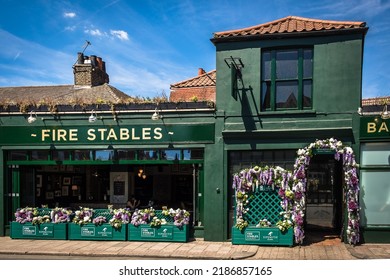 London, United Kingdom, July 2022, View Of The Exterior Of The Fire Stables, A Gastropub In Wimbledon Village Decorated For The Time Of The Tournament