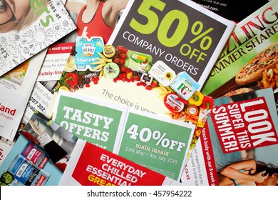LONDON, United Kingdom - JULY 25: Sample of junk mail items delivered to a private residence in England as advertising for local retail businesses and services