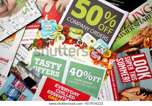 LONDON, United Kingdom - JULY 25:\
Sample of junk mail items delivered to a private residence in\
England as advertising for local retail businesses and\
services