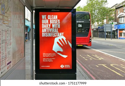 London, United Kingdom - June 06, 2020: Light Ad At Lewisham Bus Stop Informing Passengers All Buses Are Cleaned And Disinfected Regularly During Coronavirus Outbreak To Reduce Virus Spreading