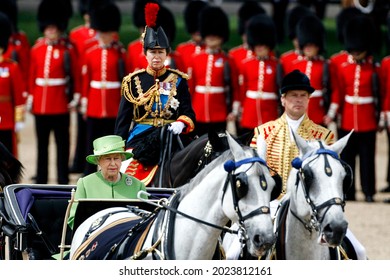 London, United Kingdom - June 16, 2007: Her Royal Highness Queen Elizabeth II followed on horse by Princess Anne arrive to the Trooping the Colour ceremony. 