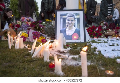 London, United Kingdom - June 17, 2016: Jo Cox's Vigil. A Candlelit Vigil Was Held In Parliament Square For The Murdered MP, Jo Cox. People Lit Candles, Left Flowers, Wrote Messages And Mourned.