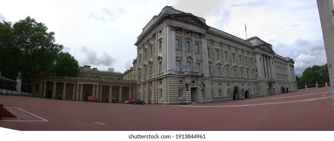 London, United Kingdom - June 2004: Buckingham Palace Landscape Fish Eye View Showing Outdoor Building Design And Red Floor Exterior