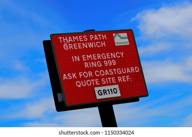 London, United Kingdom - June 23, 2018: Sign By River Thames, London, United Kingdom, Providing Emergency Contact Details For The Coastguard And Location Details