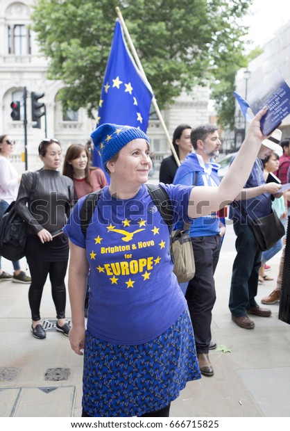London, United KIngdom - June 23, 2017: One Year\
On. The referendum to leave the European Union happened exactly one\
year ago. The No 10 Downing Street Vigil was a sea of blue in\
protest.