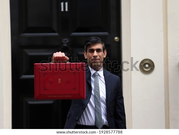 London,\
United Kingdom - March 03 2021: Chancellor of the Exchequer Rishi\
Sunak leaves 11 Downing Street with the red dispatch box ahead of\
revealing the budget in the House of\
Commons.