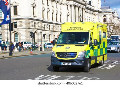 London, United Kingdom - March 04, 2015: An Ambulance Is Speeding Up After A Bend In Central London.