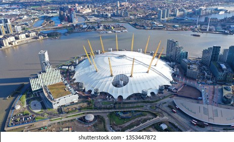 London / United Kingdom - March 18 2019: Aerial drone bird's eye view of iconic concert Hall of O2 Arena in North Greenwich Peninsula