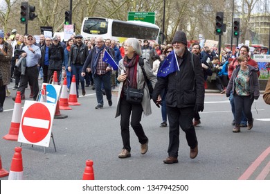 London, United Kingdom - March 23 2019: Middle Aged People Walking Down Park Lane During The Revoke March - Image