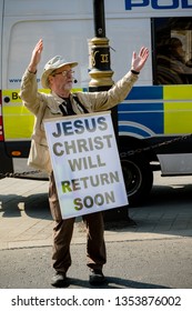 London, United Kingdom, March 29th 2019:- Street Preacher Outside The British Parliament Stating Jeus Christ Will Return Soon