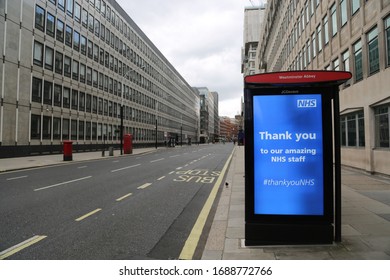 LONDON, UNITED KINGDOM - MARCH 31 2020:  A Deserted Bus Stop With A NHS Ad On Victoria Street Is Seen Deserted As The Lockdown Continues Due To Coronavirus (COVID1-19) Pandemic In London, England. 