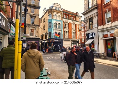 London, United Kingdom - March 6 2022: It Is Busy On The Street With Many Hip People On The Sidewalk In The SOHO Neighborhood