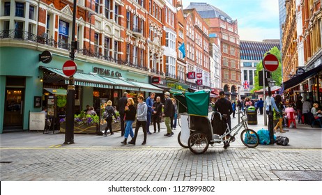 LONDON, UNITED KINGDOM - MAY 13 2018: London tricycle taxi availble for tourist in the inner area of city of London and the city of Westminster