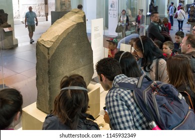 LONDON, UNITED KINGDOM - MAY 15: People looking on Rosetta stone in British museum on May 15, 2018 in London