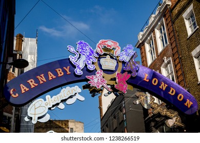 London, United Kingdom, November 17th 2018:- Sign Above Carnaby Street In The Soho Area Of London, Famous Since The 1960s For Its Independent Fashion Shops.