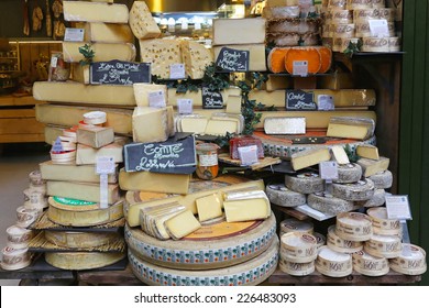LONDON, UNITED KINGDOM - NOVEMBER 20: Cheese shop in London on NOVEMBER 20, 2013. A variety of cheeses for sale at Borough Market in London, United Kingdom.