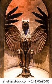 London / United Kingdom - November 23 2017: Warner Bros Harry Potter Studio. The Stairwell Gargoyle Guarding Headmaster's Office In Hogwarts Castle.
Behind It Was  Circular, Moving Stone Staircase.