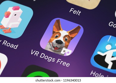 London, United Kingdom - October 05, 2018: The VR Dogs Free - Dog Simulation Game Mobile App From Tapps Tecnologia Da Informação Ltda. On An IPhone Screen.