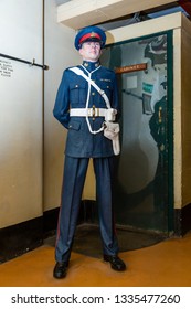 London, United Kingdom - October 3 2013: An Armed Guard In Front Of The Door To The Cabinet War Room, Part Of The Churchill War Rooms Museum
